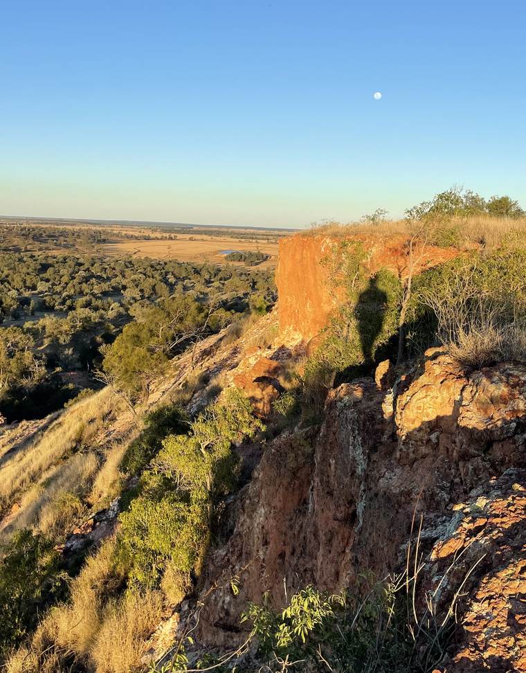 Red escarpment over the downs